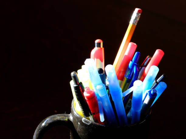 istock Pens and Pencils in Mug on Desk 1430389953