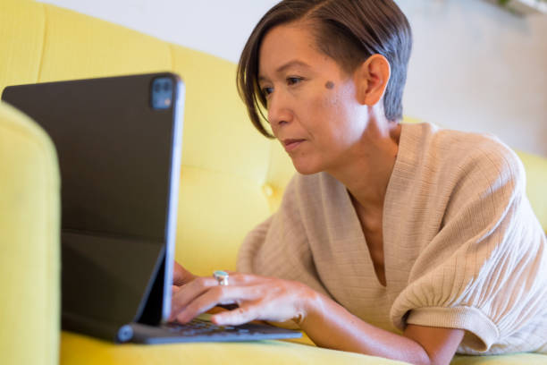 istock Woman on her laptop 1430393700
