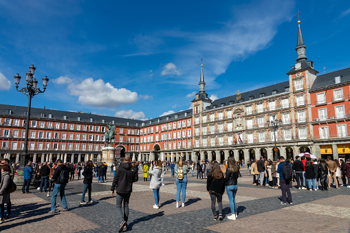 People on Plaza Mayor (town square) in Madrid Spain