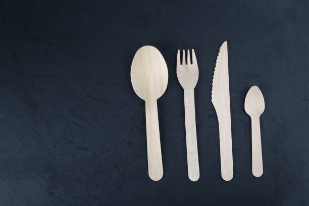 istock wooden serving pieces isolated on black background flat lay 1430398108