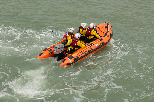 Small single engined lifeboat RIB (Rigid Inflatable Boat) with four crew.