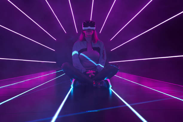 istock Woman is using virtual reality headset to access in metaverse. 1430400768