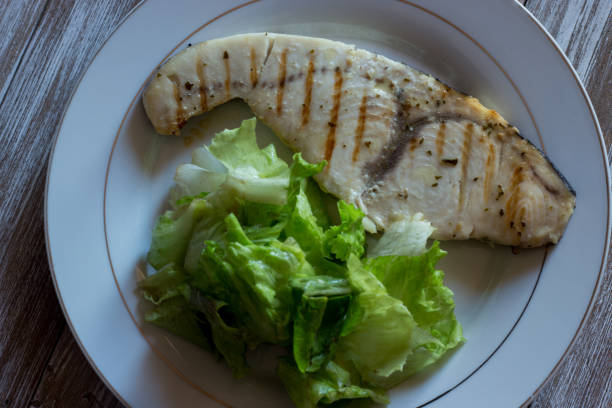 istock Grilled swordfish with organic salad garnish 1430401044