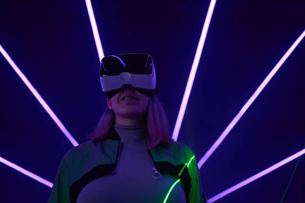 istock Woman is using virtual reality headset to access in metaverse. 1430402064
