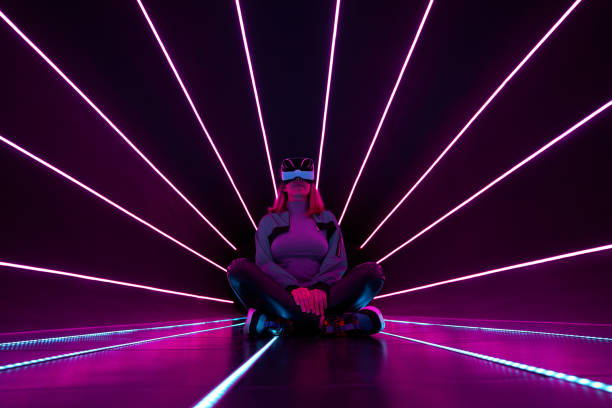 istock Woman is using virtual reality headset to access in metaverse. 1430402394