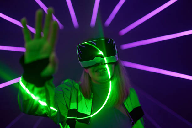 istock Woman is using virtual reality headset to access in metaverse. 1430402777