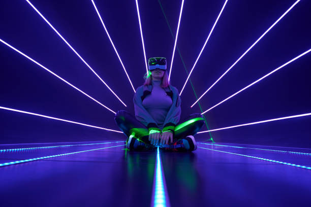 istock Woman is using virtual reality headset to access in metaverse. 1430403665