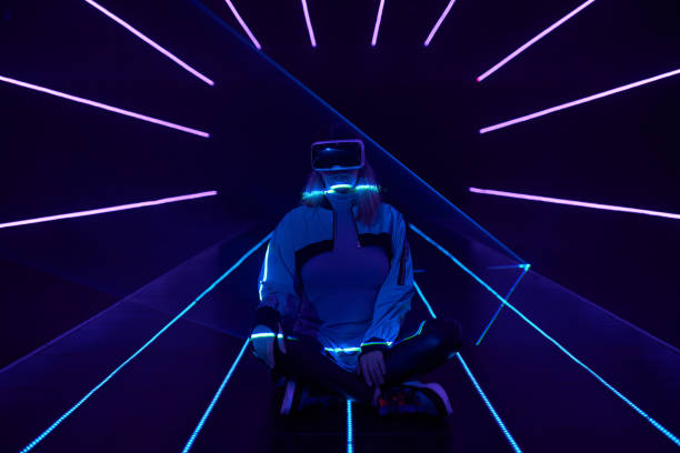 istock Woman is using virtual reality headset to access in metaverse. 1430403711
