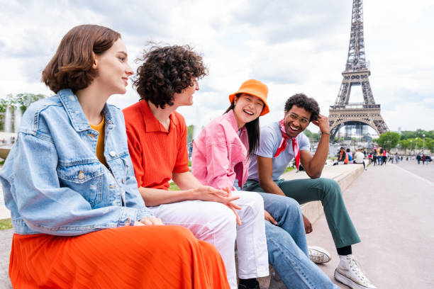 istock Group of young happy friends visiting Paris and Eiffel Tower 1430413864