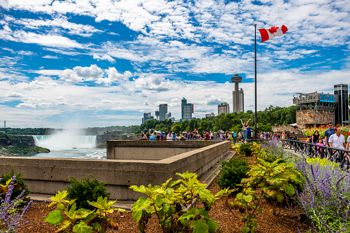 Niagara Falls, Canada - August 14, 2022: Many people looking to the Niagara Falls in Canada.