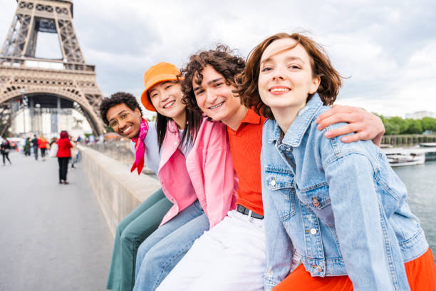 istock Group of young happy friends visiting Paris and Eiffel Tower 1430414028