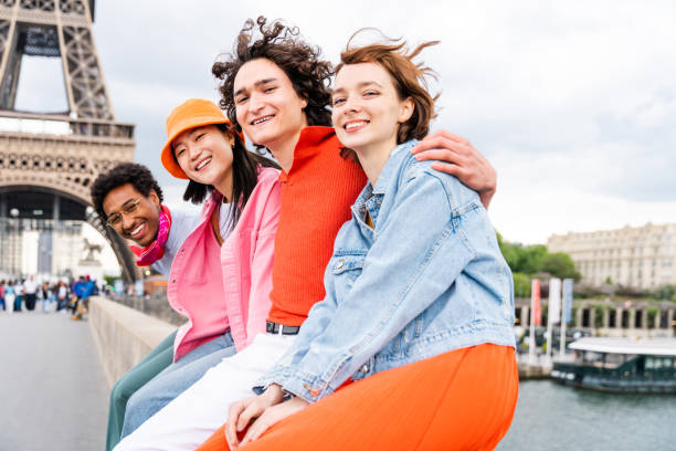 istock Group of young happy friends visiting Paris and Eiffel Tower 1430414206