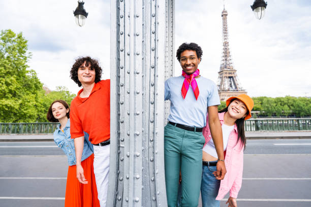 istock Group of young happy friends visiting Paris and Eiffel Tower 1430414376