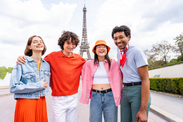 istock Group of young happy friends visiting Paris and Eiffel Tower 1430414458