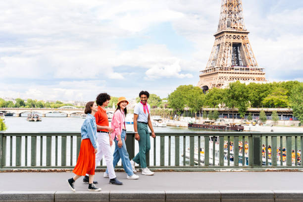istock Group of young happy friends visiting Paris and Eiffel Tower 1430414486