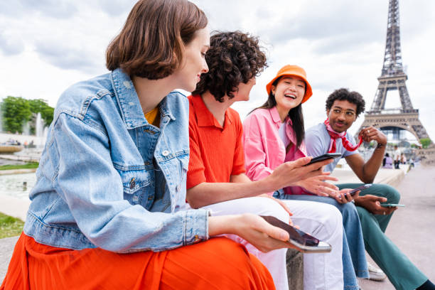 istock Group of young happy friends visiting Paris and Eiffel Tower 1430414595