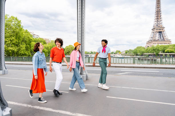 istock Group of young happy friends visiting Paris and Eiffel Tower 1430414787