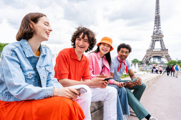 istock Group of young happy friends visiting Paris and Eiffel Tower 1430414858
