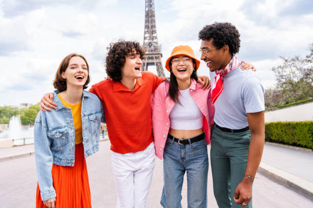 istock Group of young happy friends visiting Paris and Eiffel Tower 1430415075