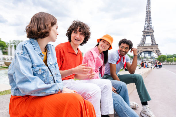 istock Group of young happy friends visiting Paris and Eiffel Tower 1430415806