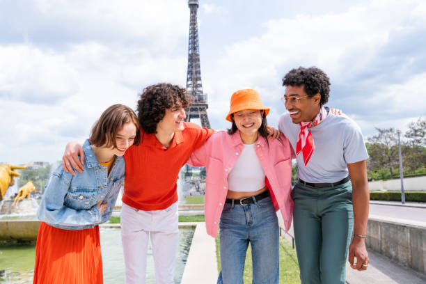 istock Group of young happy friends visiting Paris and Eiffel Tower 1430415867