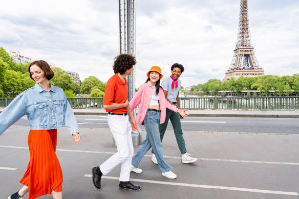 istock Group of young happy friends visiting Paris and Eiffel Tower 1430416185