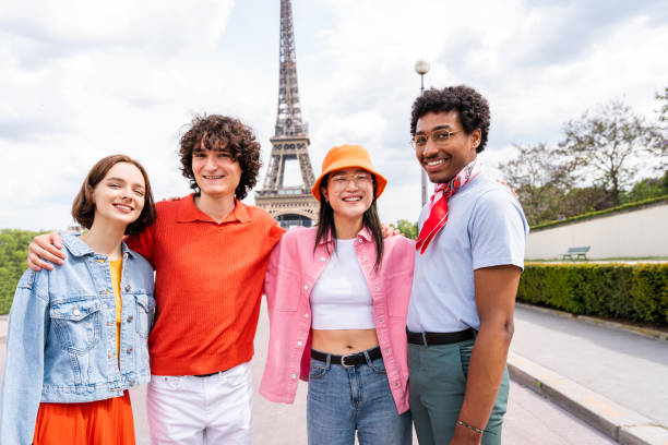 istock Group of young happy friends visiting Paris and Eiffel Tower 1430416340