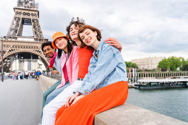 istock Group of young happy friends visiting Paris and Eiffel Tower 1430416683