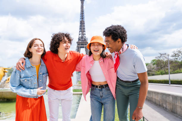 istock Group of young happy friends visiting Paris and Eiffel Tower 1430416873