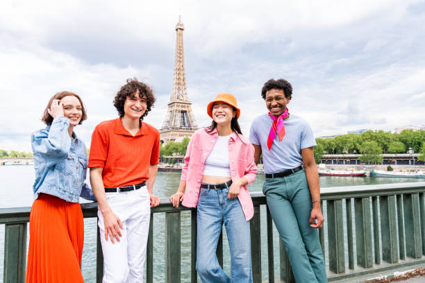 istock Group of young happy friends visiting Paris and Eiffel Tower 1430417027
