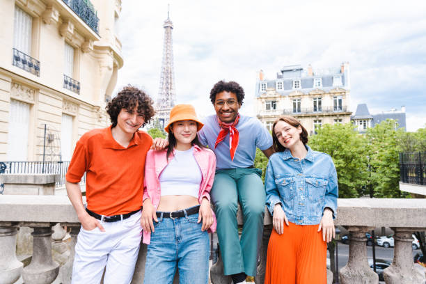 istock Group of young happy friends visiting Paris and Eiffel Tower 1430417084
