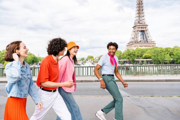istock Group of young happy friends visiting Paris and Eiffel Tower 1430417132