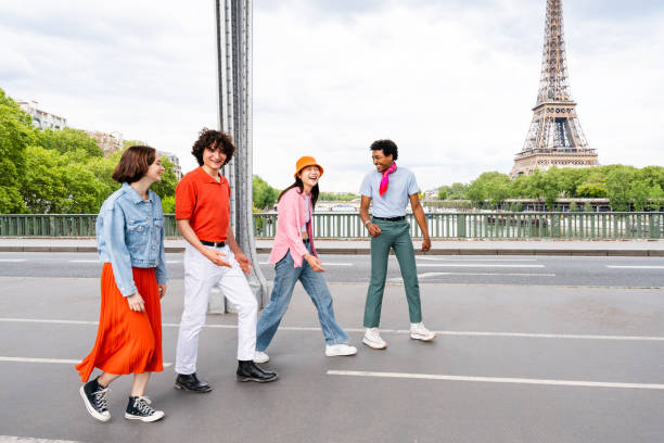 istock Group of young happy friends visiting Paris and Eiffel Tower 1430417722
