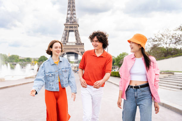 istock Group of young happy friends visiting Paris and Eiffel Tower 1430417796