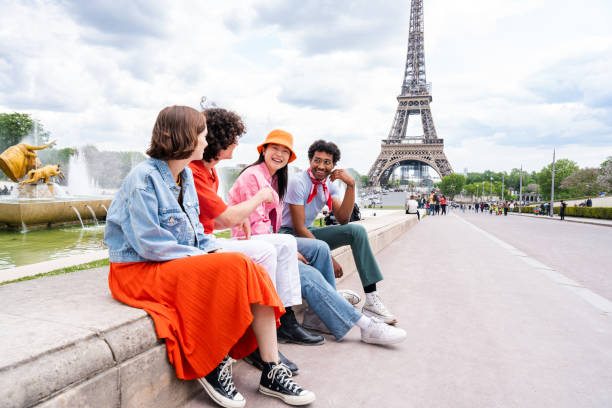 istock Group of young happy friends visiting Paris and Eiffel Tower 1430417833