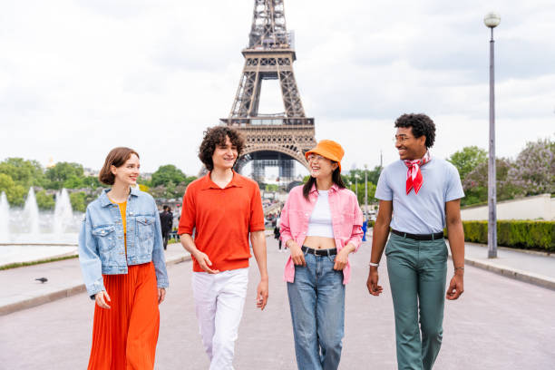 istock Group of young happy friends visiting Paris and Eiffel Tower 1430417971