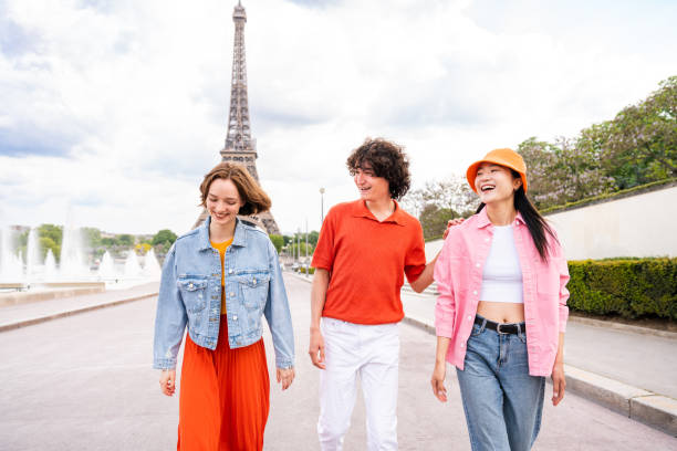 istock Group of young happy friends visiting Paris and Eiffel Tower 1430418017