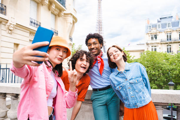 istock Group of young happy friends visiting Paris and Eiffel Tower 1430418136