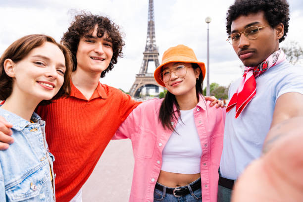 istock Group of young happy friends visiting Paris and Eiffel Tower 1430418191