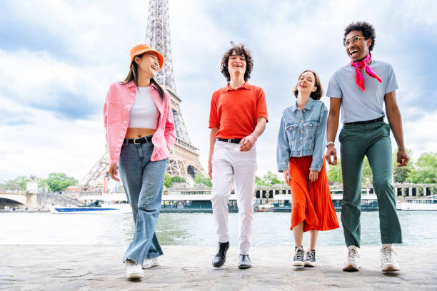 istock Group of young happy friends visiting Paris and Eiffel Tower 1430418293