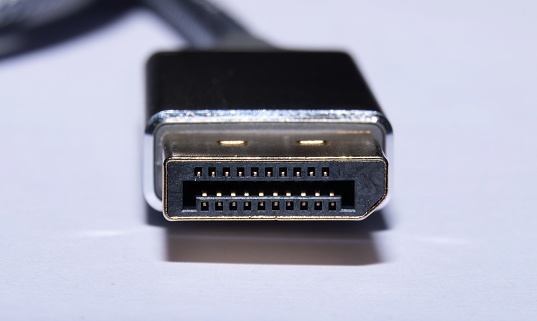 Close up photo of a DisplayPort Connector. The DisplayPort connector is mainly used to transmit video data between two devices. These devices include Computers, Gaming Consoles, TVs and monitors.