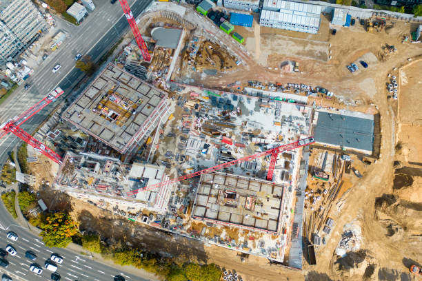 istock Large construction site, cranes and equipment - aerial view 1430423845