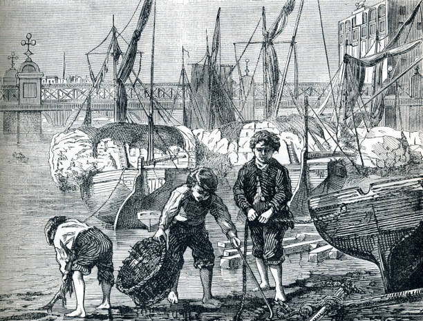 Boys collecting with baskets and nets on the River Thames