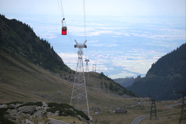 istock Red cable car in the romanian carphatians 1430425468