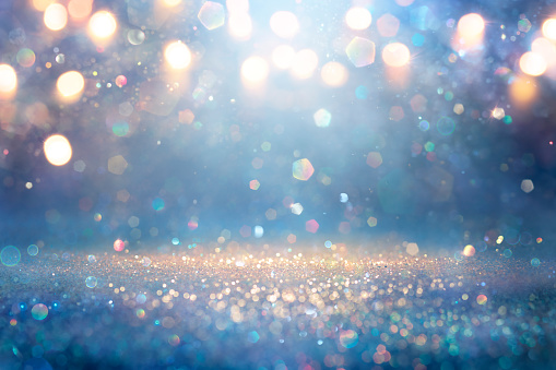 Bokeh Lights And Glittering In Abstract Christmas Backdrop