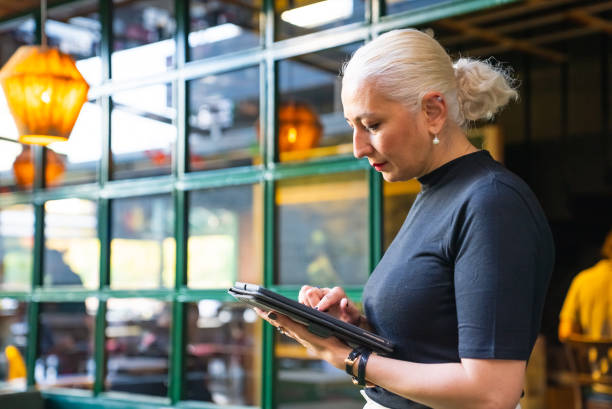 istock Businesswoman using digital tablet out of office 1430428217