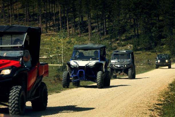 istock Off Road Vehicles on Mountain Ridge Dirt Road 1430431754