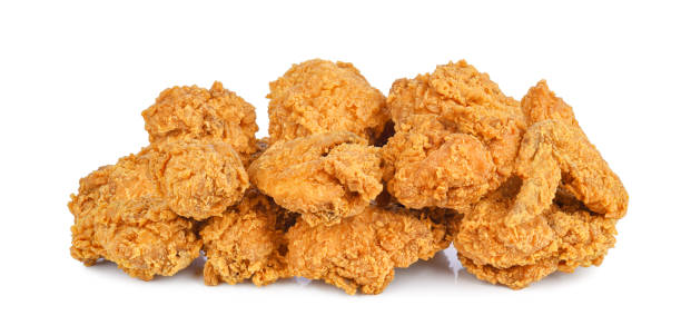 istock Heap of fried chicken isolated on white 1430433160