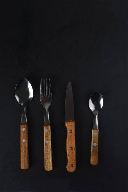istock set of serving pieces isolated on black background flat lay 1430434084