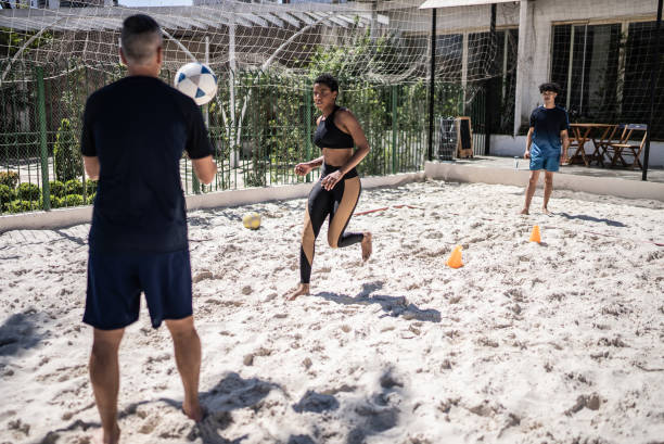 istock Woman training in a sand court 1430437602